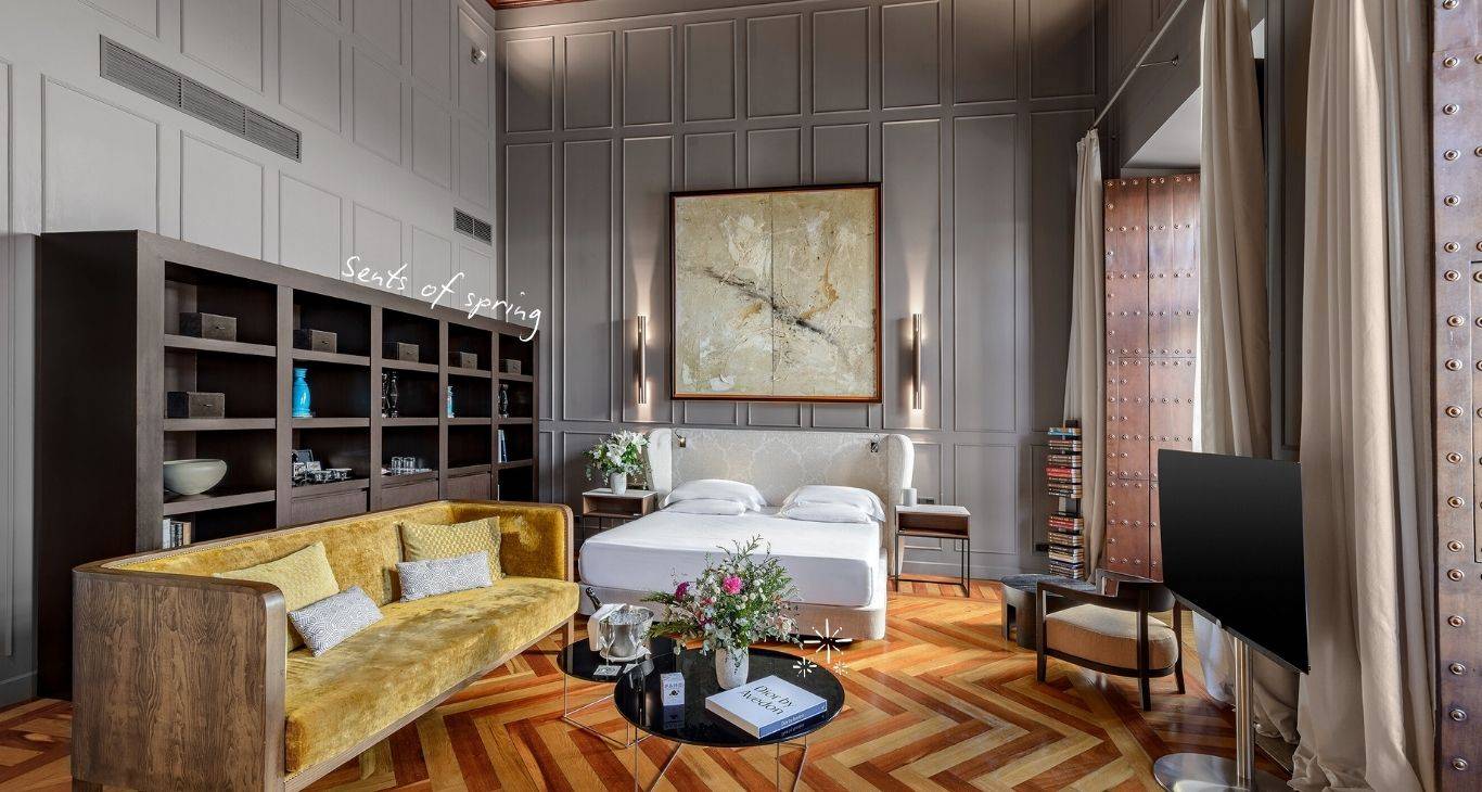 CoolRooms Palacio de Villapanés 套房起居區與臥床