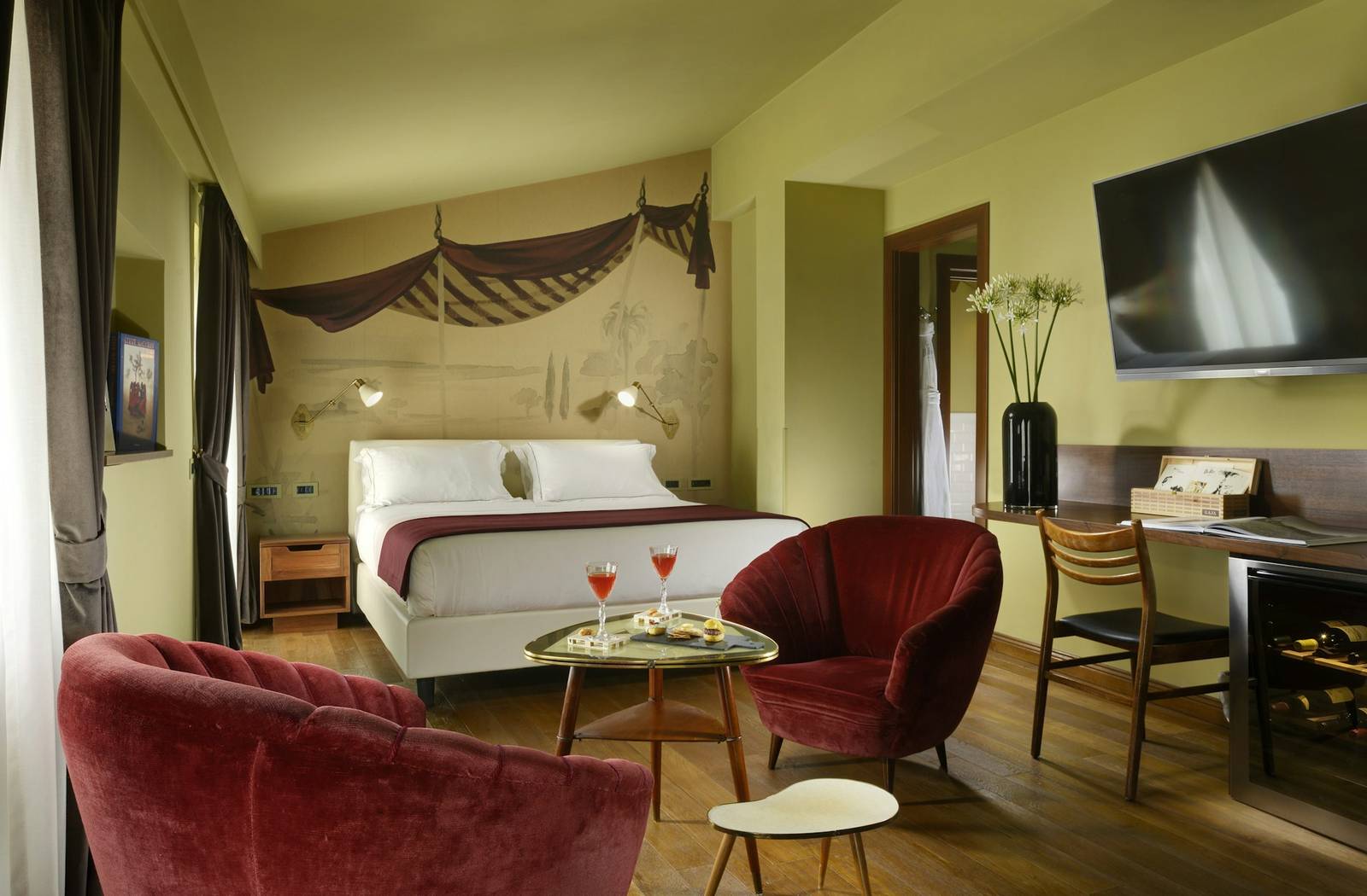 羅馬 Hotel De' Ricci 套房臥室與休憩角落