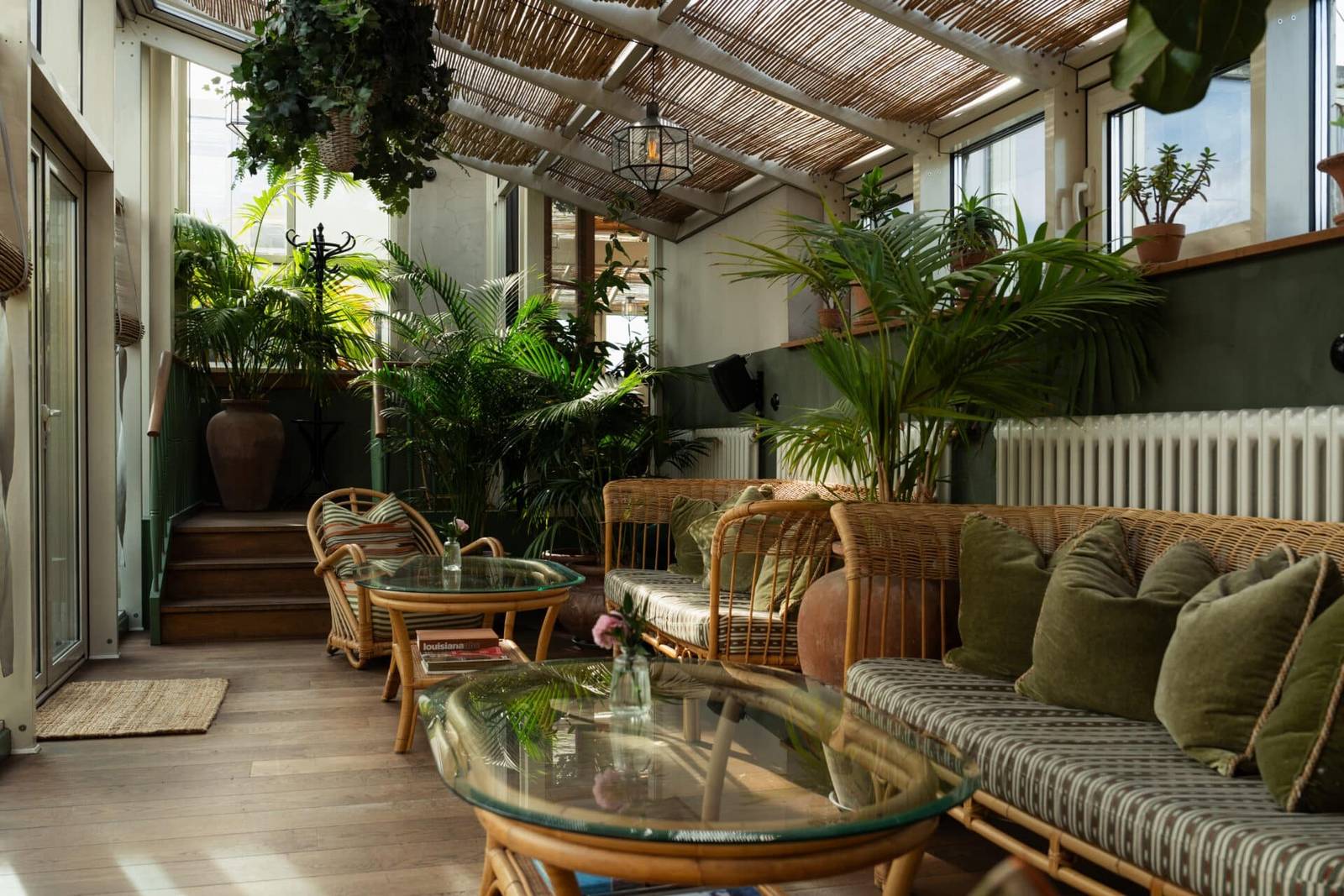 Hotel Sanders 屋頂溫室綠意座位區