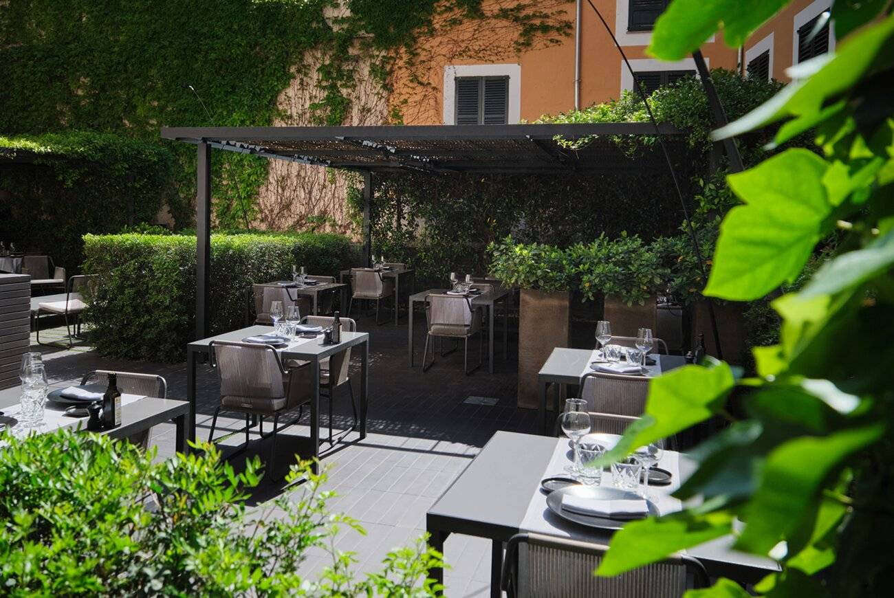 Sant Francesc Hotel Singular Quadrat 餐廳綠意花園座位